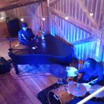 Dueling Hobbits Piano Fundraiser Iowa Birds Eye View Blue